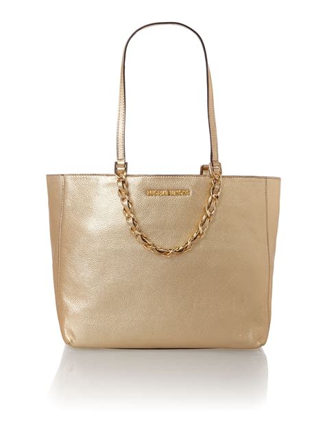 michael kors gunmetal handbag|Michael Kors metallic gold handbag.